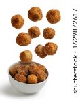 Homemade croquettes flying isolated from white background