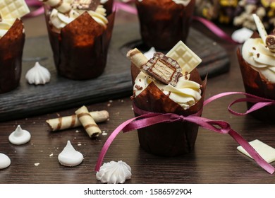 Homemade cupcakes with cream on a dark background, Concept for Valentine's Day, Birthday and Father's day - Powered by Shutterstock