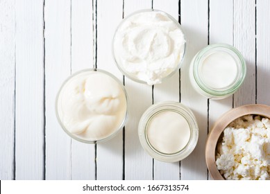 homemade dairy product samples on white wood table background - Shutterstock ID 1667313574