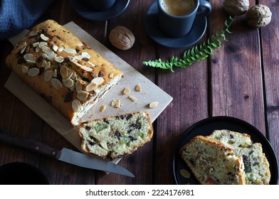 Homemade Delicious Bread Cake With Nuts, Dried Fruits Cut Into Pieces On Wooden Table. Directly Above. Copy Space.