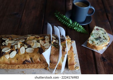 Homemade Delicious Bread Cake With Nuts, Dried Fruits Cut Into Pieces On Wooden Table. Directly Above. Copy Space.