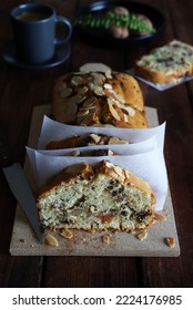 Homemade Delicious Bread Cake With Nuts, Dried Fruits Cut Into Pieces On Wooden Table. Directly Above. Copy Space.