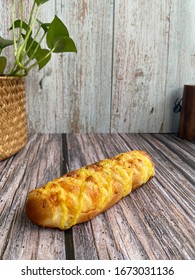 Homemade Of Delicious Cheese Stick Bun On The Wooden Background