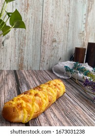 Homemade Of Delicious Cheese Stick Bun On The Wooden Background