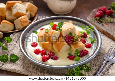 Homemade delish dessert, vanilla sauce, fresh forest fruit, original name ducat buns [[stock_photo]] © 