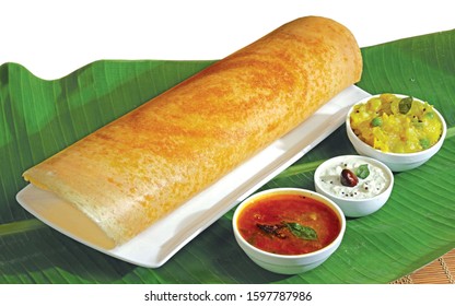 Homemade Dosa, Dhosa, Masala, Plain, Maisuri (Ghee Roast) With Chutney And Sambar On Banana Leaf Isolated South Indian Breakfast Thali