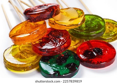 Homemade dried fruit lollipop made from natural dehydrated berries on white background. Healthy no sugar sweets vegan vegetarian food concept. - Shutterstock ID 2257839819