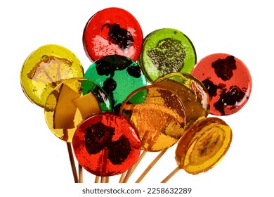 Homemade dried fruit lollipop made from natural dehydrated berries on white background. Healthy no sugar sweets vegan vegetarian food concept. - Shutterstock ID 2258632289