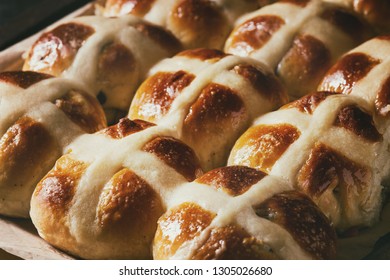 Homemade Easter Traditional Hot Cross Buns On Oven Tray With Baking Paper Over Dark Wooden Background. Close Up