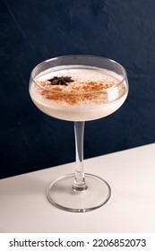 Homemade Eggnog With Cinnamon And Nutmeg In Martini Glass.