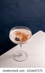 Homemade Eggnog With Cinnamon And Nutmeg In Martini Glass.