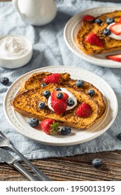 Homemade Eggnog French Toast with Whipped Cream and Berries