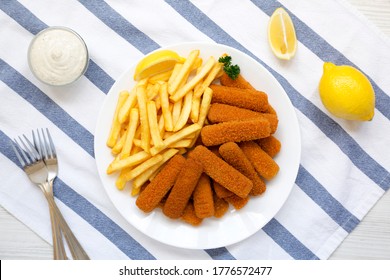 Homemade Fish Sticks And Fries With Tartar Sauce, Overhead View. Flat Lay, Top View, From Above. 