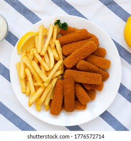 Homemade Fish Sticks And Fries With Tartar Sauce On Cloth, Top View. Flat Lay, Overhead, From Above. 