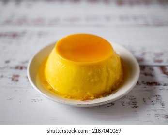 Homemade Flan With Caramel On Rustic White Table, Spanish Style