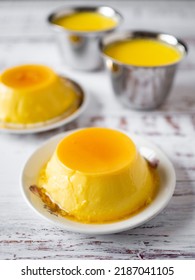 Homemade Flan With Caramel On Rustic White Table, Spanish Style