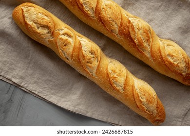 Homemade French Bread Baguette on a gray background, top view. - Powered by Shutterstock