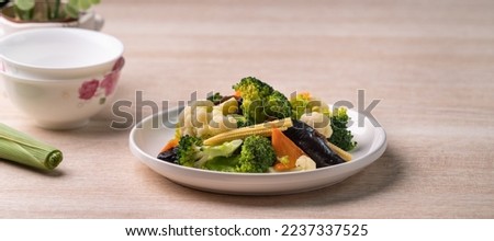 Homemade fresh boiled vegetables with cauliflower, broccoli, black fungus and baby corn, healthy eating lifestyle concept.