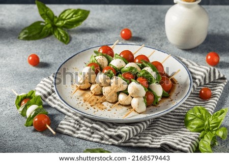 Homemade Fresh Caprese Skewer Appetizer with Tomato Basil and Mozarella