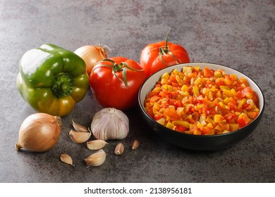 Homemade Fresh Sofrito Sauce From Summer Vegetables Close-up In A Bowl On The Table. Horizontal
