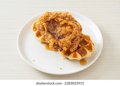homemade fried chicken waffle with honey or maple syrup - Shutterstock ID 2283023915