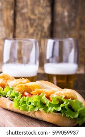 Homemade Fried Fish Sandwich. Fried Catfish Po Boy On Rustic Wooden Table 