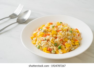 homemade fried rice with mixed vegetable (carrot, green bean peas, corn) and egg