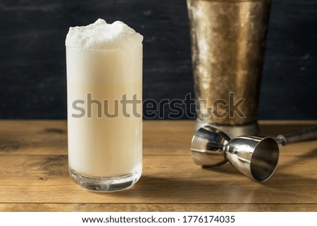 Homemade Frothy Ramos Gin Fizz Cocktail with Cream