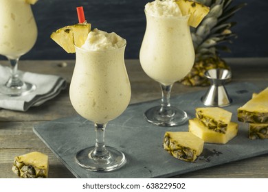 Homemade Frozen Pina Colada Cocktail with a Pineapple Garnish