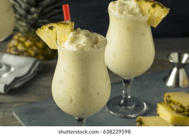 Homemade Frozen Pina Colada Cocktail with a Pineapple Garnish