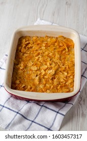 Homemade Funeral Potatoes Casserole In A Dish, Side View. 