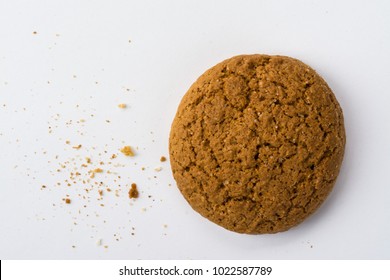 Homemade Ginger Biscuit With Peanuts And Raisins. Delicious Honey Sweetmeal Digestive Cookie On A Plate. On A White Background With Light Shadow. Detailed Closeup Studio Shot.