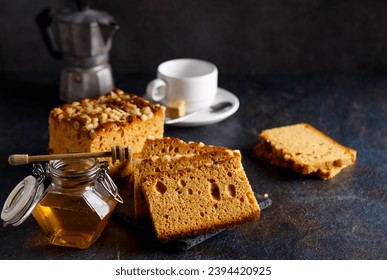 Homemade gingerbread made with honey, served on a plate.