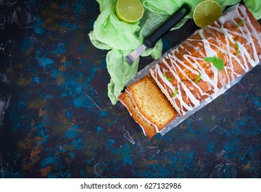 Homemade Glazed Lime Pound Cake, Decorated With Mint, On Vintage Table, Sliced And Ready To Eat. Space For Text