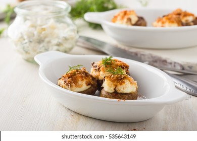 Homemade Goat Cheese Stuffed Mushrooms On White Table 