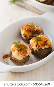 Homemade Goat Cheese Stuffed Mushrooms On White Table