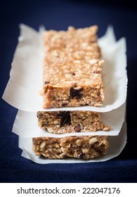 Homemade Granola Protein Bars With Peanut Butter, Honey, Nuts, Cacao And Raisins.