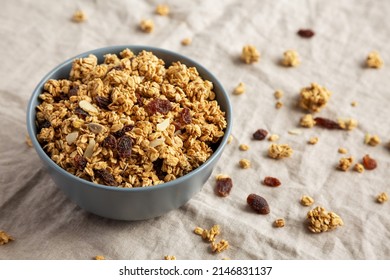 Homemade Granola With Raisins And Almonds  In A Bowl, Side View. 