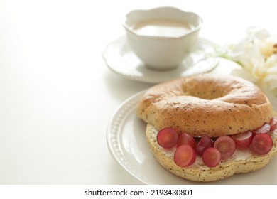 Homemade Grape And Cream Cheese In Tea Leaves Bagel Sandwich For Delicious Breakfast 