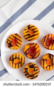 Homemade Grilled Peaches On A White Plate, Top View. Flat Lay, From Above, Overhead.