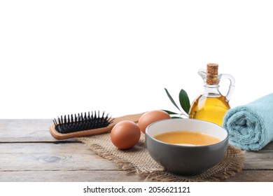 Homemade Hair Mask In Bowl, Fresh Ingredients And Brush On Wooden Table Against White Background. Space For Text