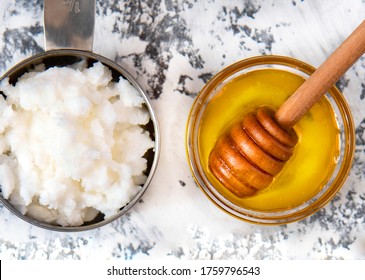 Homemade Hair Mask Made Out Of Coconut Butter And Honey - White Background