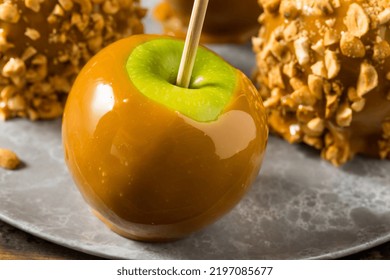 Homemade Halloween Candy Taffy Apples With Caramel And Peanuts