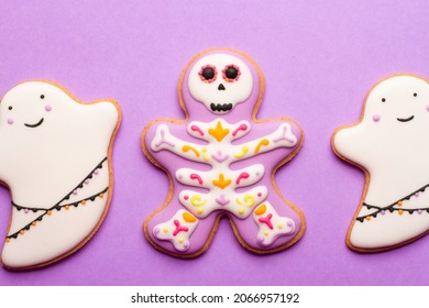 Homemade Halloween Cookies, Ghosts, Flying Mice On Purple Background.