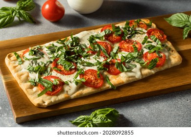 Homemade Healthy Margherita Flatbread PIzza With Basil And Tomato