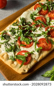 Homemade Healthy Margherita Flatbread PIzza With Basil And Tomato