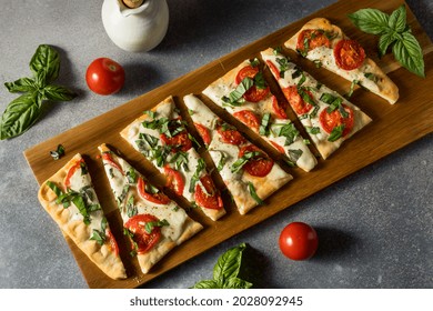 Homemade Healthy Margherita Flatbread PIzza With Basil And Tomato