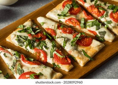 Homemade Healthy Margherita Flatbread PIzza With Basil And Tomato