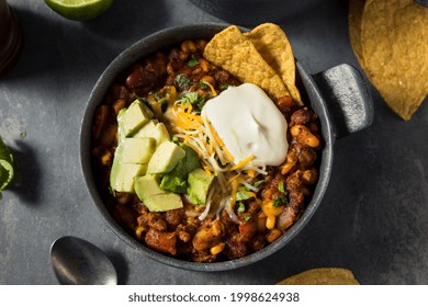 Homemade Hearty Turkey White Bean Chili with Cheese and Chips