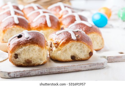 Homemade hot cross buns on Easter table